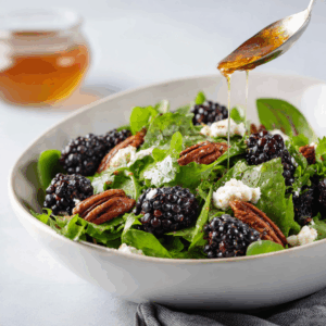 Bramensalade met geitenkaas en pecannoten